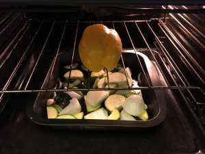 Place the yellow bell pepper on a roaster above the other veggies